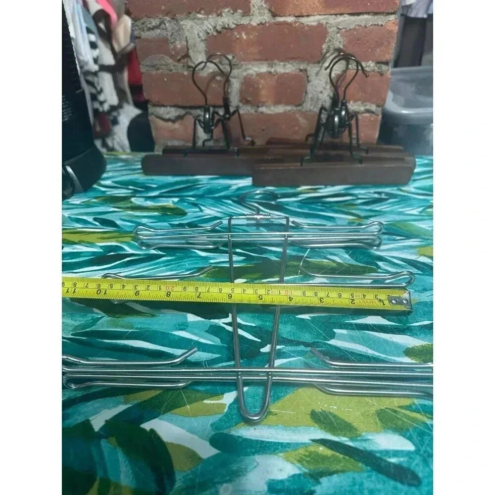 6 Wooden, 1 Metal Clothing Hangers